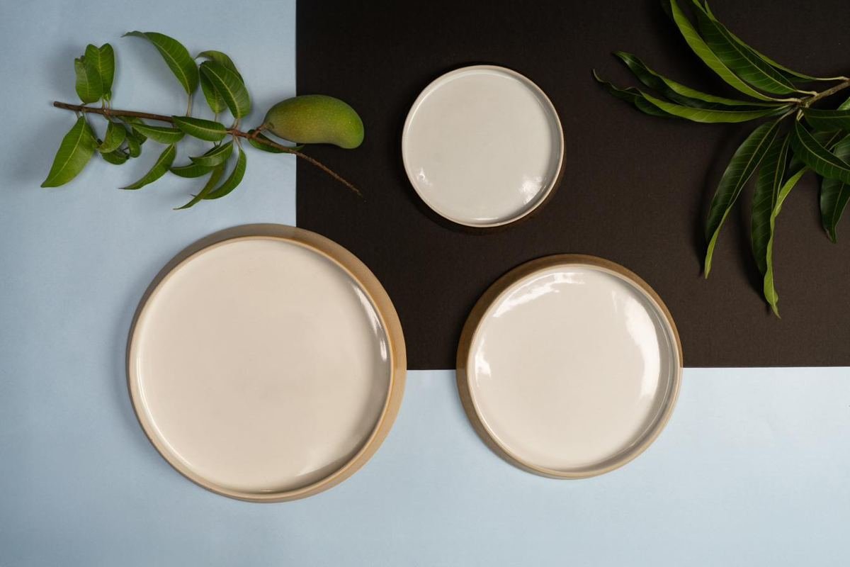 Handmade stoneware dinner and quarter plates for restaurants