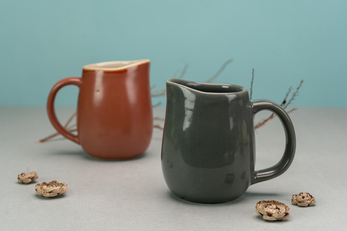 Rust and slate stoneware jugs