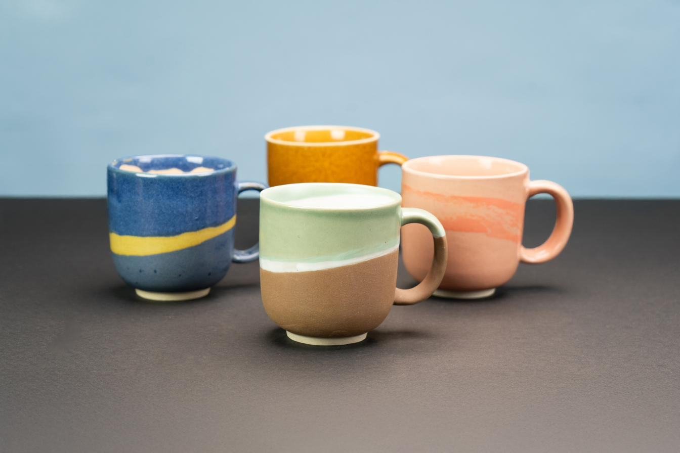 Colour-dipped stoneware mugs