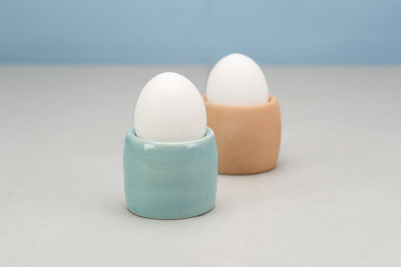 Egg cups in sky blue and peach