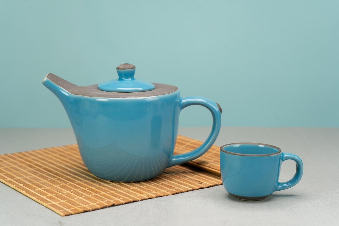Blue stoneware teapot and cup